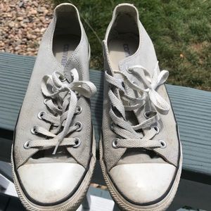 Grey and white Converse sneakers